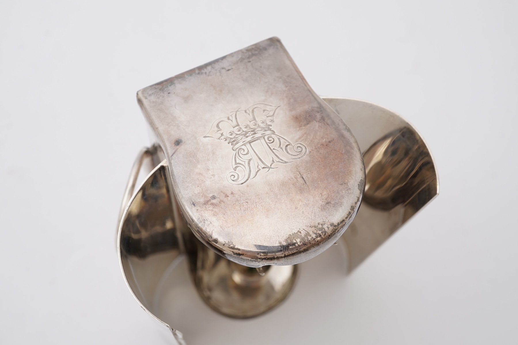 A Victorian silver travelling coach lamp by Thomas Johnson I, in original fitted leather case, retailed by Leuchers, 38 Piccadilly, London